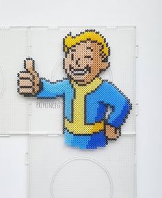 an image of a pixelated man giving the thumbs up sign on a piece of paper