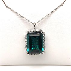 14k white gold necklace with a 8.69ct, emerald cut, Blue Tourmaline with .56cts of Diamonds. This was made by the store owner, and, if you have any questions, please don't hesitate to call Bob at 973-543-7833 or send us a message. Thank you for visiting! Formal Emerald Gemstones With Accents, Formal Emerald Baguette Cut Necklace, Formal Emerald Necklace With Rectangular Pendant, Formal Emerald Rectangular Pendant Jewelry, Silver Emerald Cut Necklace With Brilliant Detail, Fine Jewelry Emerald Cut Emerald Necklace For Formal Events, Formal Emerald Cut Emerald Necklace, Formal Emerald Rectangular Pendant Necklace, Emerald Cut Emerald Jewelry With Gemstone Accents