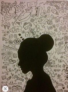 the silhouette of a woman's head with many doodles on it