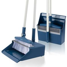 two brooms and a dustbin on a white background