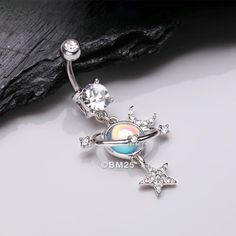 Feel the force of the universe with this Aurora Celestial Sparkle Sun and Moon Orbit Belly Button Ring! Create your own destiny and take risks with this bold, mesmerizing piece of jewelry. Adventure starts here! * Material: 316L Stainless Steel * Bar Size: 14 GA (1.6mm), 10mm (3/8") Suitable for * Navel Piercings It is always recommended to know your exact piercing size to ensure fitment, safety, and comfort. Please consult your local piercer if you are unaware of your size. - - - - - - - - - - Moon Orbit, Navel Piercing, Stainless Steel Bar, Belly Button Ring, Button Ring, Sun And Moon, Belly Rings, Body Jewellery, Belly Button