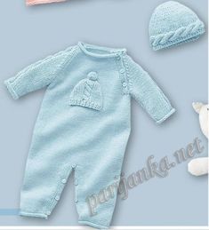 a baby's outfit, hat and teddy bear laying next to each other on a blue background