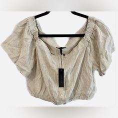 All Orders Ship In 1-3 Business Days! Bobi Black Nwt Oatmeal Button Down Off Shoulder Crop Top Conditions: Like New/Clean Condition The Color Is Oatmeal Size L Smoke Free Home Questions? Drop A Comment Down Below! Beige Buttoned Tops For Day Out, Cream Linen Top With Buttons, Cream Linen Tops With Buttons, Beige Tops With Button Closure For Day Out, Cream Everyday Top With Button Closure, Everyday Cream Top With Button Closure, Neutral Button-up Top With Buttons, Cream Top With Button Closure For Everyday, Casual Neutral Blouse With Buttons