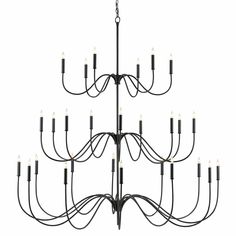 a large chandelier with many lights hanging from it's sides and arms