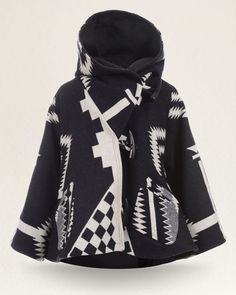 a black and white jacket with an abstract pattern on it, the hood is open