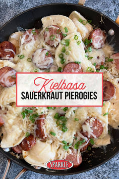 a skillet filled with pasta and sausage covered in saucerkraut pierogies