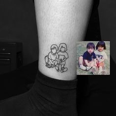 a small tattoo on the ankle of a child and an image of a man holding a dog