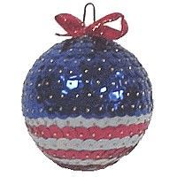 a blue ornament with red, white and blue stripes