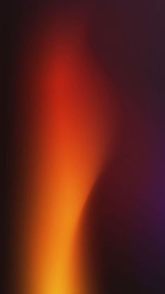 an abstract blurry background with orange and purple colors