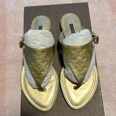 Absolutely Gorgeous. Gold Color Leather With Gold Color Hardware. Never Wore. No Scratch , No Flaws. Comes With Box, Dust Bag And The Instructions. Luxury Gold Toe Post Sandals, Luxury Toe Post Sandals, Shoes Louis Vuitton, Louis Vuitton Shoes, Thong Sandals, Women's Shoes Sandals, Shoes Sandals, Gold Color, Dust Bag