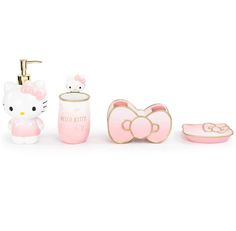 hello kitty bathroom accessories including soap dispenser, toothbrush holder and mirror