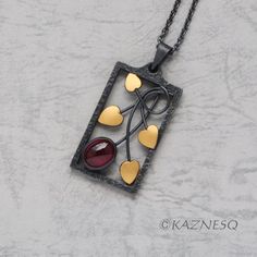 "Please tell me your phone number when you buy it because the international courier needs it. The stone is a 4.650ct oval cabochon ruby. The body is made of oxidized silver but the leaves are covered with fine gold foil by the technique called Keum Boo. This Art Nouveau style design will be a good accent on your body in special occasions. Size: 50mm x 25mm x 7mm Please look at the 3rd photo. Chain length: 50cm (20\") Weight: 19g *The last photo is a Photoshopped simulation image. * If you pay by Photo Chain, Keum Boo, Cabochon Ruby, Wild Berry, Jewelry Images, Oxidized Silver, Oval Cabochon, Silver Pendant Necklace, Art Jewelry