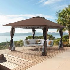 a gazebo sitting on top of a wooden deck