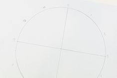 an image of a circle being drawn on paper