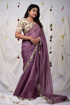 Grape saree with ivory border and floral kalamkari hand painted pattern, elevated with resham, cutdana beads. Comes along with an unstitched blouse piece. - Aza Fashions Navratri Chanderi Blouse With Embroidered Border, Chanderi Blouse With Embroidered Border For Navratri, Festive Cotton Silk Blouse Piece With Embroidered Border, Designer Anarkali Blouse With Embroidered Border, Cotton Silk Saree With Dori Work For Eid, Bollywood Style Chanderi Blouse With Embroidered Border, Eid Cotton Silk Saree With Dori Work, Designer Blouse With Embroidered Border For Diwali, Designer Wear Blouse With Embroidered Border For Diwali