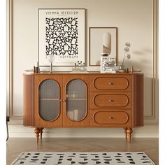 a wooden cabinet with glass doors in a living room