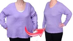 the woman is wearing a purple sweater with an arrow in front of her chest and back