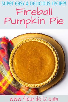 a pie sitting on top of a wooden plate next to a plaid cloth and text overlay