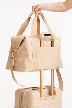 Béis 'The BEISICS Duffle' in Beige - Large Travel Duffle Bag in Beige Womens Overnight Bag, Versatile Weekender Bag, Versatile Weekender Bag With Luggage Sleeve For Weekend, Functional Weekend Duffle Bag, Versatile Rectangular Duffle Bag For Weekend, Rectangular Functional Duffle Bag For Weekend, Beige Functional Travel Bag For Overnight Trips, Functional Beige Travel Bag For Overnight Trips, Functional Beige Duffle Bag For On-the-go