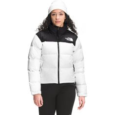 We embrace the style of yore with The North Face 1996 Retro Nuptse Jacket. We appreciate how its aesthetic is the direct descendants of the original Nuptse jacket, with the 700-fill down keeping us cozy on the chilliest days in the current winter weather. When the sun's out, the hood packs out of your way while you stroll around town, and when the day warms up and you don't need the jacket anymore, the whole thing stuffs into the inside pocket so you can carry it around easily. 1996 Nuptse Jacket, Doudoune The North Face, Best Winter Jackets, The North Face 1996 Retro Nuptse, 1996 Retro Nuptse Jacket, Insulated Jacket Women, The North Face 1996, North Face 1996, Retro Nuptse Jacket