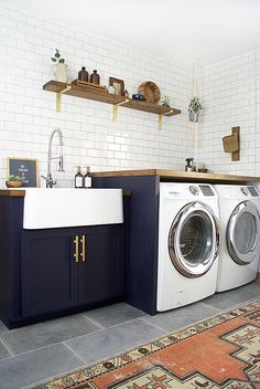 an instagramted photo of a washer and dryer in a kitchen