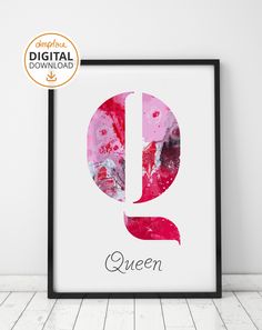 a pink and red poster with the letter q in it's center on a white wall