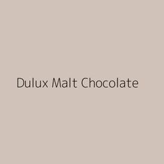 the words dulux mat chocolate are in black and white