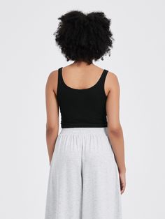 Comfortable Casual Elegance. Our Celine Top was designed to beautifully show off your neckline and collarbone with the perfect "C".  Made with a supersoft ribbed knit.  The length of the cropped top falls at a length to help elongate the body shape.   Model is 5'6, 34B, waist 27.2", wearing size 2. P1, P2 sizes available for those who are 105 lbs or less. Solid Seamless Cropped Top, Seamless Solid Color Cropped Top, Seamless Solid Color Crop Top For Loungewear, Solid Ribbed Cropped Top, Fitted Crop Top With Cropped Hem For Loungewear, Solid Cropped Tank Top For Loungewear, Fitted Crop Top For Loungewear, Cropped Tank Top For Loungewear, Chic Crop Top For Loungewear