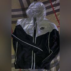 Authentic Nike Full-Zip Up Windrunner Windbreaker Sportswear Tech Fleece Jacket // Reflective / Drawstring / Hooded / Lightweight Material Color: Black / White Size: 1x Picked It Up In The Nike Outlet, Comes Exactly As Pictured No Additional Accessories Or Tags. Payed Well Over $100 Can Compare To A Men’s Size Medium Equivalent. (All Items Listed On This Page Are Kept In Storage Untouched Until Sold) Luxury Nike Track Jacket For Sports, Luxury Nike Outerwear For Sports, Windrunner Jacket, Nike Track Jacket, Nike Outlet, Running Vest, Nike Air Max Tn, Tech Fleece, Polo Dress