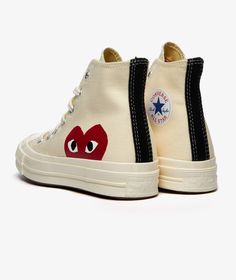 The Big Heart Chuck 70 Hi x Converse  item  from the brand   Comme des Garçons Play  which is part of the SU2023  season, has arrived || is now available at . Play X Converse, Play Converse, Rain Parka, Rei Kawakubo, Converse White, Comme Des Garcons Play, Chuck 70, Red Sole, Vintage Canvas