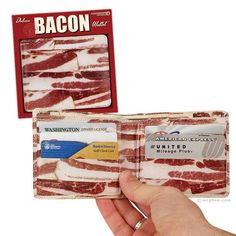 a bacon wallet is being held up by someone's hand with the card holder open