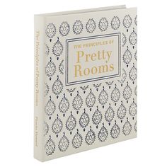 a book with an ornate pattern on the cover and title, the pringles of pretty rooms