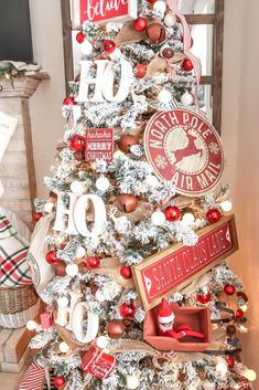 a christmas tree decorated with red and white ornaments