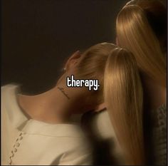 two women with long blonde hair are facing each other and the words therapy written on them