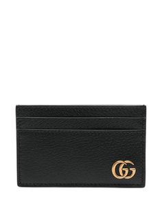 black leather textured finish tonal stitching card slots signature Double G logo internal slip pocket rectangle body This piece comes complete with a protective dust bag. We've partnered with Good On You — an independent agency that rates how brands perform in relation to their impact on the planet, people and animals, with a multi-criteria rating simplified to a five points scale. In order to be awarded our conscious label, larger brands need to score a minimum of four out of five ('Good'), while smaller brands must score at least three out of five ('It's A Start'). This item comes from a brand rated three out of five ('It's A Start') by Good on You at the time it was added on FARFETCH. Please note, this is a brand-level rating and does not guarantee that this product is made with conscio Gucci Designer Wallets With Logo, Designer Gucci Wallets With Logo, Luxury Gucci Wallet With Logo, Black Rectangular Wallet With Logo, Black Rectangular Wallets With Logo, Formal Rectangular Wallet With Logo, Elegant Rectangular Logo Card Holder, Gucci Rectangular Wallet With Rfid Blocking, Classic Black Card Holder With Logo Plaque