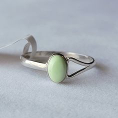 Sterling Silver Lemon Chrysoprase Ring Signed/Stamped Nj 925 925 Sterling Silver Genuine Gemstone Condition: New With Size Tag Dainty Split Shank Cabochon Size 7 See Mandrel Photo For Exact Sizing Lemon Chrysoprase Stimulates Dynamic 'Thinking Out Of The Box, And Meditation Can Facilitate Visions And A Deep Peaceful State. Lemon Chrysoprase Helps Harmonize Relationships, Stimulating Self Love And Passion. Lemon Chrysoprase Assists In Uncovering Deceitful Unconscious Thought. (Also Called Citron Chrysoprase Ring, Split Shank, Womens Jewelry Rings, Size Tag, Self Love, Split, Meditation, Lemon, Size 7