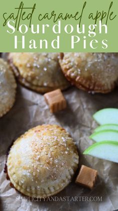 some apple hand pies are sitting on wax paper with the words salt caramel apple sourdough hand pies