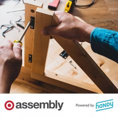 two hands are working on a piece of wood with the words assembly powered by handy