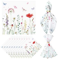 four different designs of flowers and butterflies on white paper, including one with a red flower