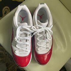 The Air Jordan 11 Retro Low 'Cherry' Received Its First Retro Release In June 2016. Originally Dropped Alongside The Air Jordan 11 Retro Low 'Columbia' In 2001, The Sneaker Incorporates An Upper White Mesh With Varsity Red Leather Overlays And A Translucent Ice-White Outsole. Jordan 11 Retro Low Cherry, Jordan Retro 11 Low, Air Jordan Retro 11, Air Jordan 11 Retro Low, Jordan Retro 11, Retro 11, Jordan 11 Retro Low, Air Jordan 11 Retro, Air Jordan Retro