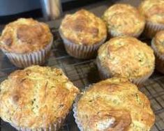 several muffins cooling on a wire rack