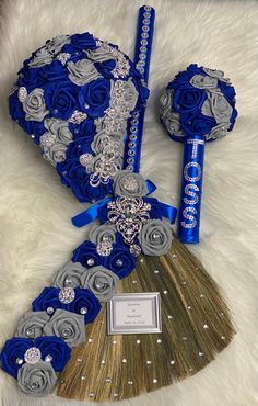 a blue and silver bridal bouquet with matching hairbrush, combs and brush