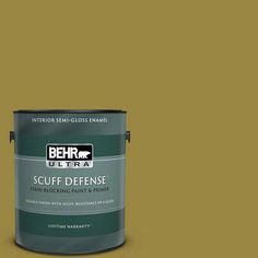 a yellow paint with the words behr ultra on it