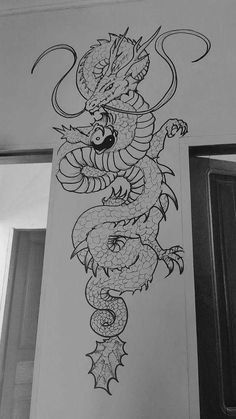 a drawing of a dragon on the wall