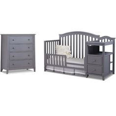 a baby crib and dresser are shown in this image