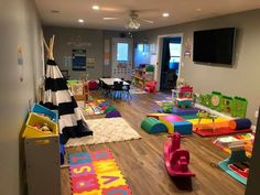 the children's playroom is full of toys and games for their little ones