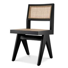 a black chair with woven seat and back