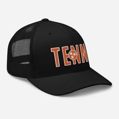 This tennessee logo includes flat style embroidery on the Classic yupoong 6606 hat.  * 60% cotton, 40% polyester * Mid-profile cap with a low-profile embroidery area * Structured, six-panel cap * 3.5″ crown (8.9 cm) * Hard buckram front panels * Mesh back * Permacurv® visor, matching undervisor * Plastic adjustable closure * Head circumference: 21⅝″-23⅝″ (54.9 cm-60 cm) Sports Trucker Cap With Flat Brim, College Trucker Hat With Embroidered Logo, College Trucker Cap With Embroidered Logo, Collegiate Trucker Hat With Embroidered Logo And Flat Brim, College Flat Bill Trucker Hat For Baseball Season, Trucker Hat With Embroidered Logo For Sports, Sports Trucker Hat With Embroidered Logo, College Snapback Trucker Hat With Embroidered Logo, Trucker Baseball Cap With Flat Brim For Sports Events