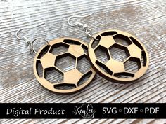 two wooden earrings with soccer ball cutouts on the front and back of each pair