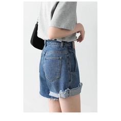 Unleash Your Streetwear Style with Retro Elegance Elevate your fashion game with our Women's Denim Shorts - a perfect blend of retro charm and contemporary style. These Irregularly Cut Blue High-waisted Short Jeans are designed for the modern woman who appreciates a touch of nostalgia in her wardrobe. Key Features: Retro Vibes: Embrace the timeless appeal of retro fashion with these irregularly cut high-waisted shorts, bringing a classic touch to your streetwear ensemble. Comfort Redefined: Crafted from denim cotton fabric, these shorts offer a comfortable and breathable fit. The fabric is skin-friendly, ensuring you stay cool and stylish all day long. Textured Elegance: The retro wash with texture adds depth to the design, giving your shorts a unique and fashionable look that stands out f Trendy High Waist Denim Blue Shorts, Trendy Blue Jean Shorts With Belt Loops, Trendy Dark Wash Short Jeans, Trendy Short Length Dark Wash Jeans, Trendy Denim Blue Cutoff Bottoms, Trendy Cutoff Denim Blue Bottoms, Trendy Denim Blue Jean Shorts With Belt Loops, Trendy Dark Wash Jean Shorts, Retro Dark Wash Short Length Jeans